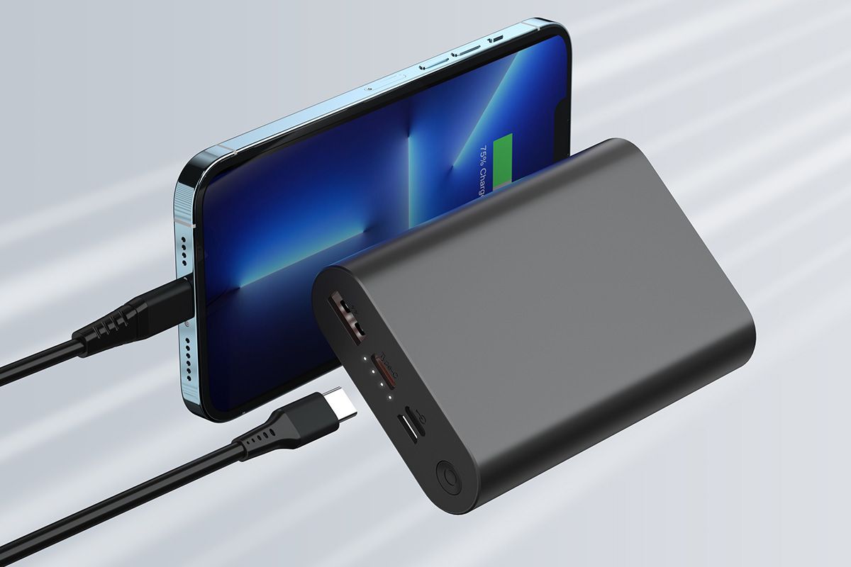 Sleek mobile power bank charging a smartphone - 3D rendering by DDB Studio